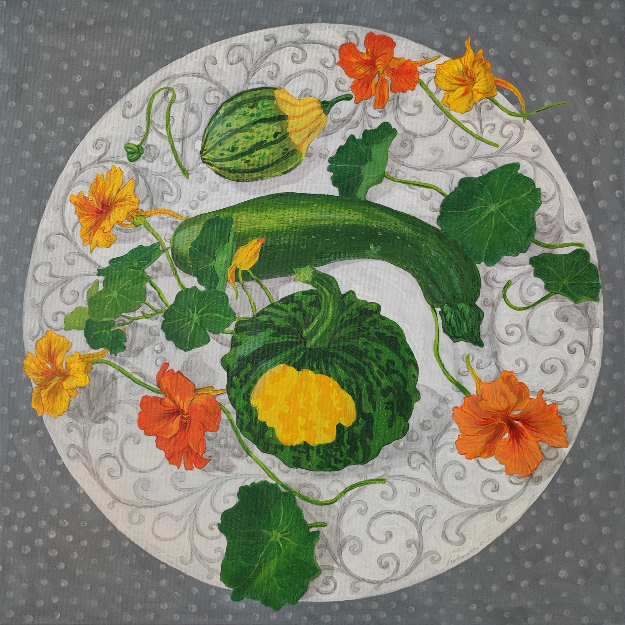Courgette and two decorative pumpkins with nasturtiums on a white plate